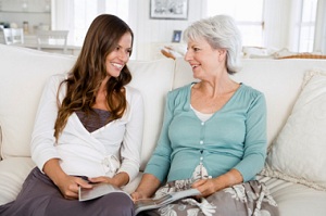 Chronic-diseasecare-plans Mother and daughter with magazine